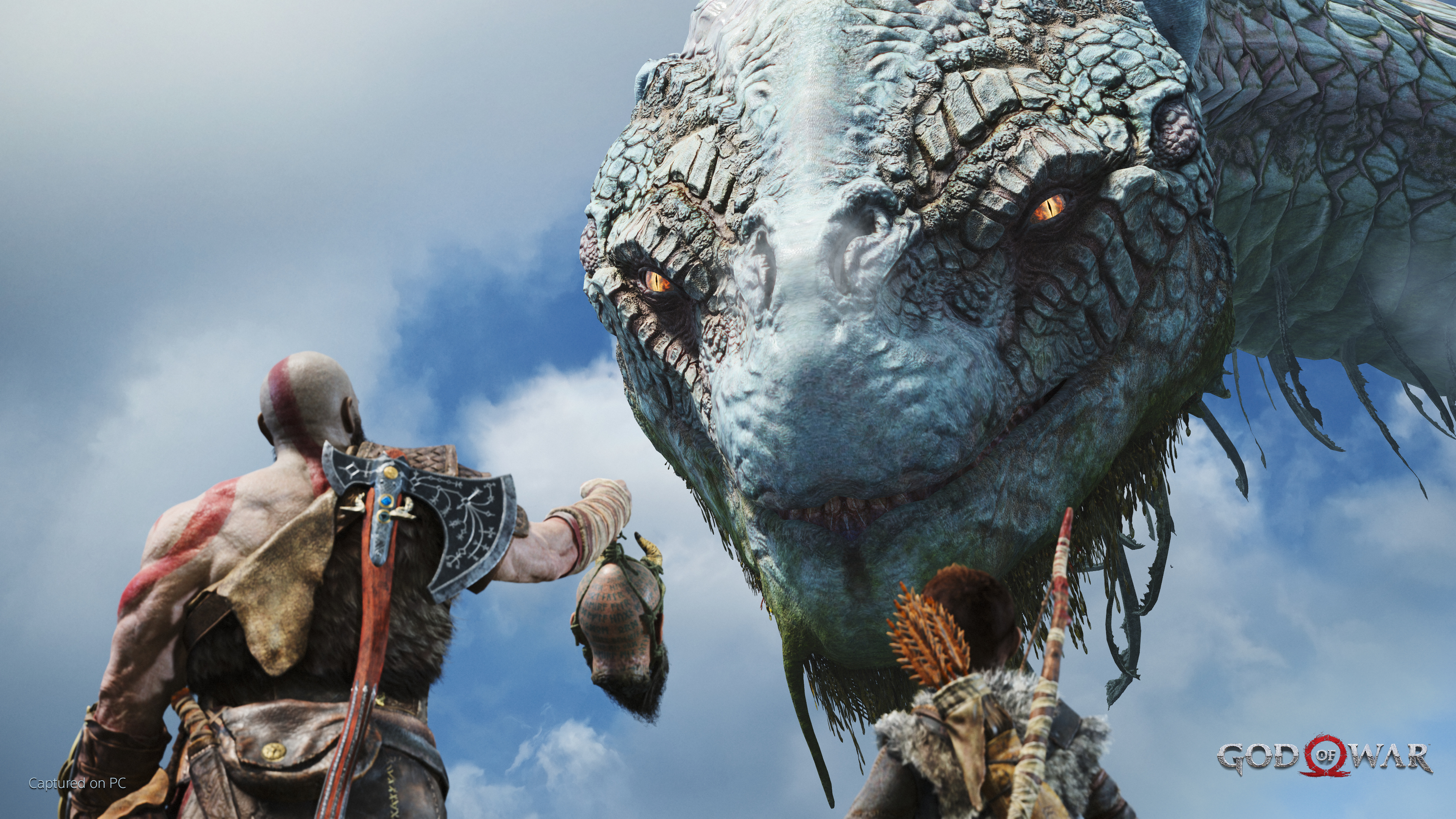 The World Serpent Jörmungandr as depicted in God of War (2018), a massive dragon-like head looking down at Kratos and Atreus.